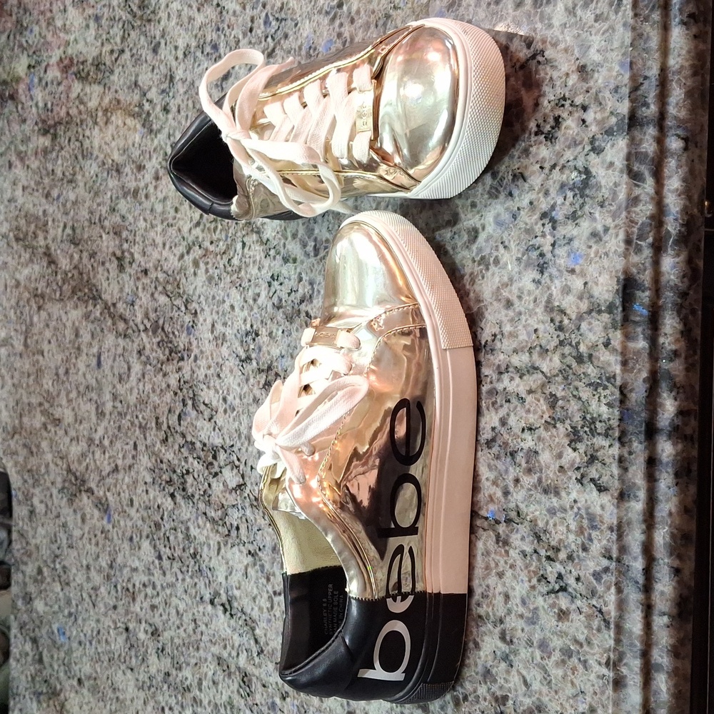 BEBE "CHARLIE" Sneakers. Sz. 6.5, Gold metallic and matte black. Small spot on
